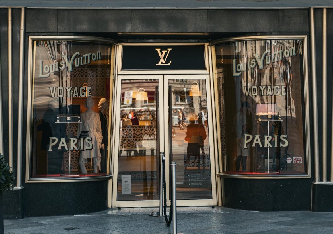 luxury fashion brands - Elegant Louis Vuitton storefront in Cologne, Germany showcasing luxury fashion.